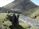 River with single mountain in the background